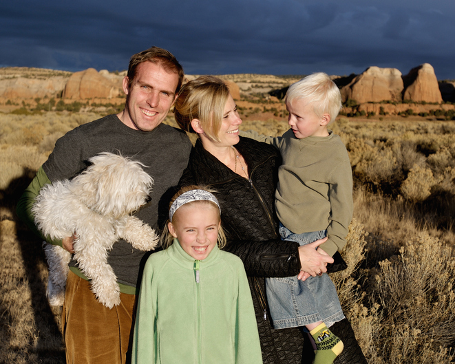 Parents with kids and dog outdoors