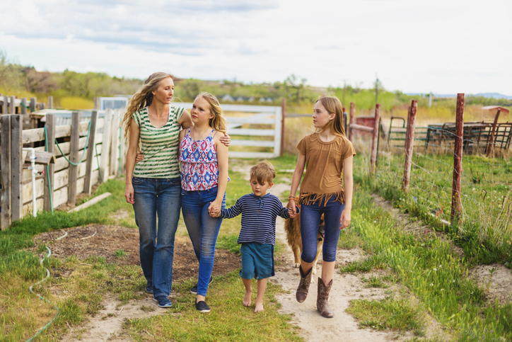 Family walking on a rural path