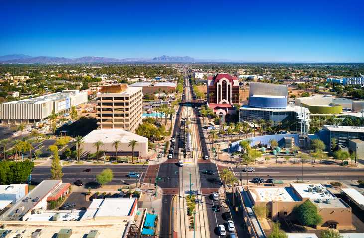 Urban street with buildings and traffic